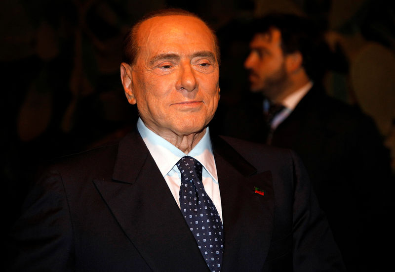 © Reuters. L'EX-ÉPOUSE DE BERLUSCONI DEVRA LUI REMBOURSER 60 MILLIONS D'EUROS