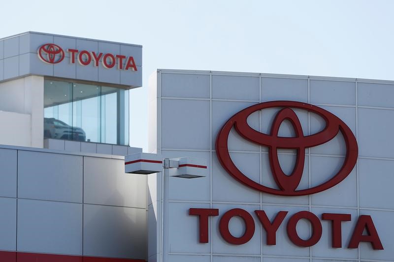 © Reuters. FILE PHOTO: Toyota logos are seen at City Toyota in Daly City, California