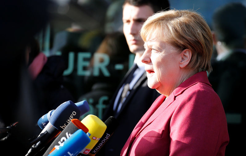 © Reuters. German Chancellor Angela Merkel talks to the media at Christian Democratic Union (CDU) headquarters in Berlin