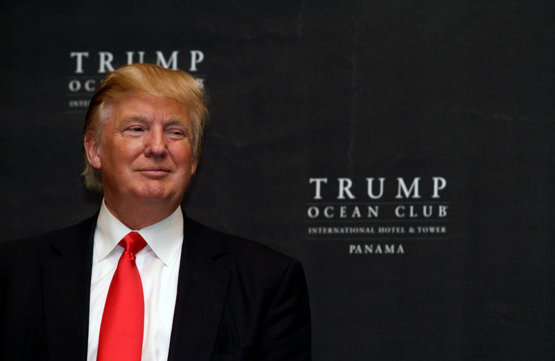 © Reuters. FILE PHOTO: U.S. property magnate Donald Trump smiles during the inauguration of the Trump Ocean Club in Panama City