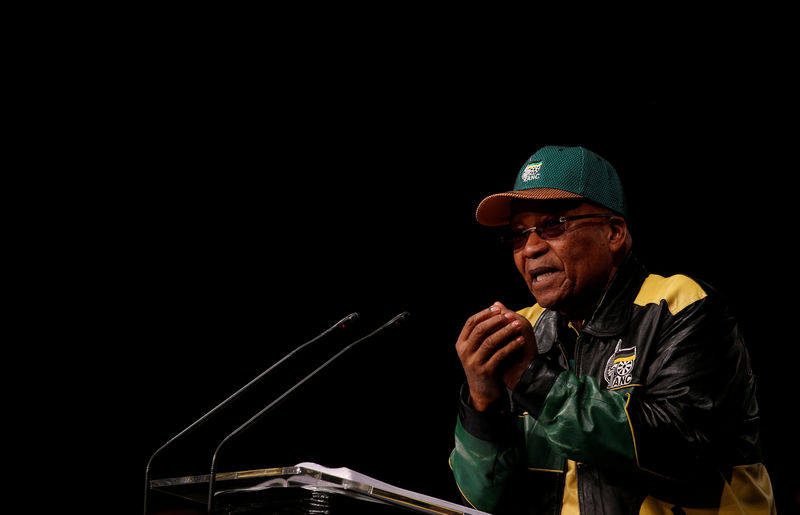 © Reuters. FILE PHOTO: South Africa's President Zuma gestures at the ANC in Soweto