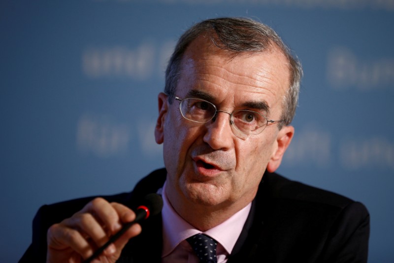 © Reuters. FILE PHOTO --  Governor of the Bank of France de Galhau attends a press conference after the Franco-German Financial Council meeting in Berlin