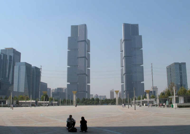 © Reuters. FILE PHOTO: New properties are seen near a square in Zhengzhou