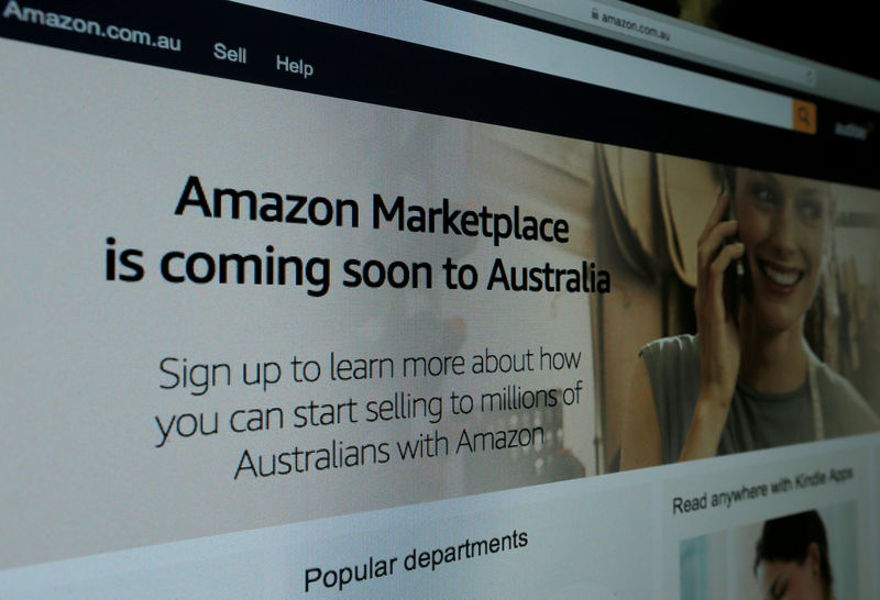 © Reuters. FILE PHOTO: A web page featuring Amazon's Australian URL is pictured in this photo illustration in a Sydney office, Australia