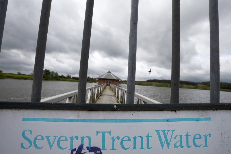 © Reuters. FILE PHOTO - A Severn Trent sign hangs on a gate at Cropston Reservoir in Cropston