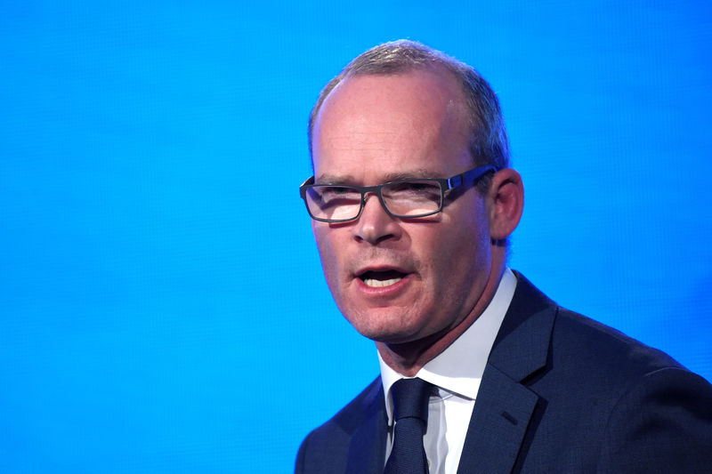© Reuters. Minister for Foreign Affairs and Trade in Ireland Simon Coveney speaks on stage during the Fine Gael national party conference in Ballyconnell