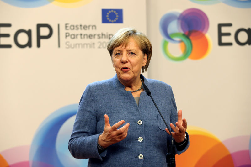 © Reuters. German Chancellor Angela Merkel holds a news conference after a Eastern Partnership summit, in Brussels