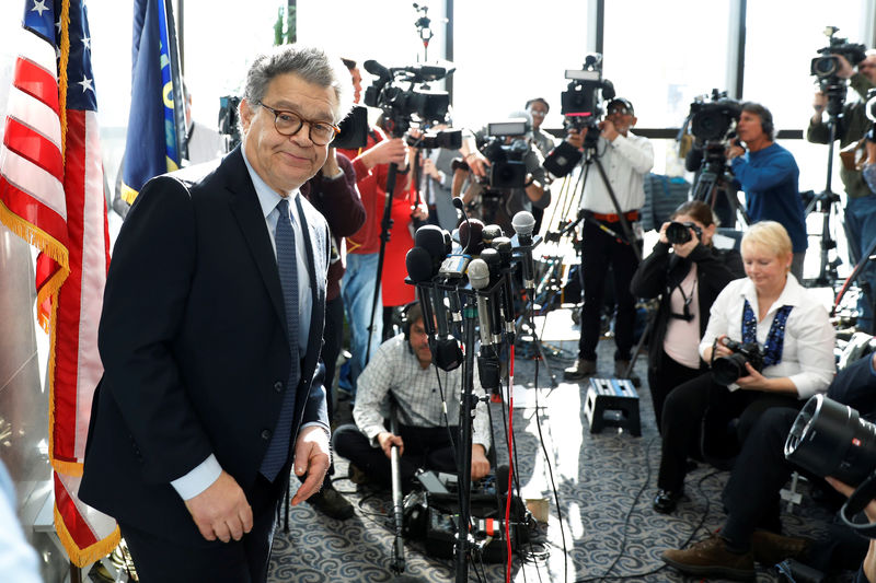 © Reuters. Senator Franken talks to the media outside his office on Capitol Hill in Washington