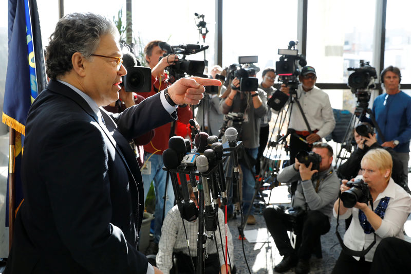 © Reuters. Senator Franken talks to the media outside his office on Capitol Hill in Washington