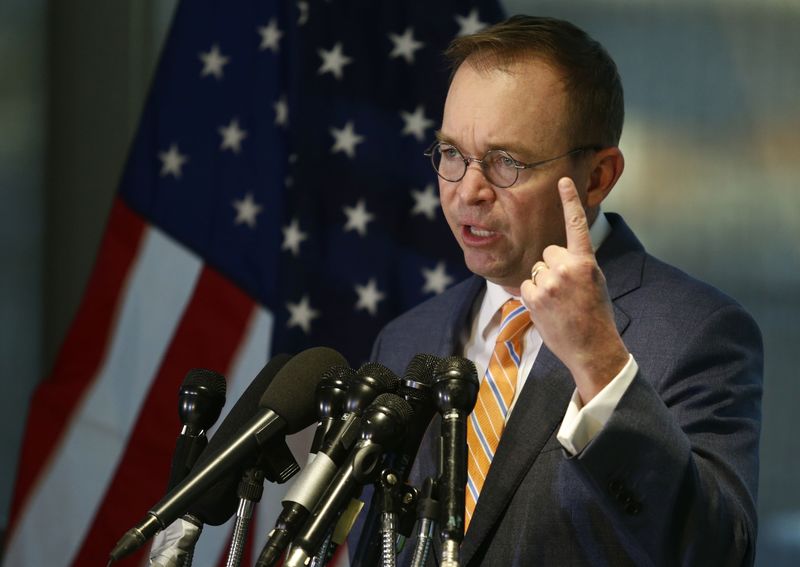 © Reuters. 0MB Director Mulvaney speaks to the media at the U.S. Consumer Financial Protection Bureau in Washington