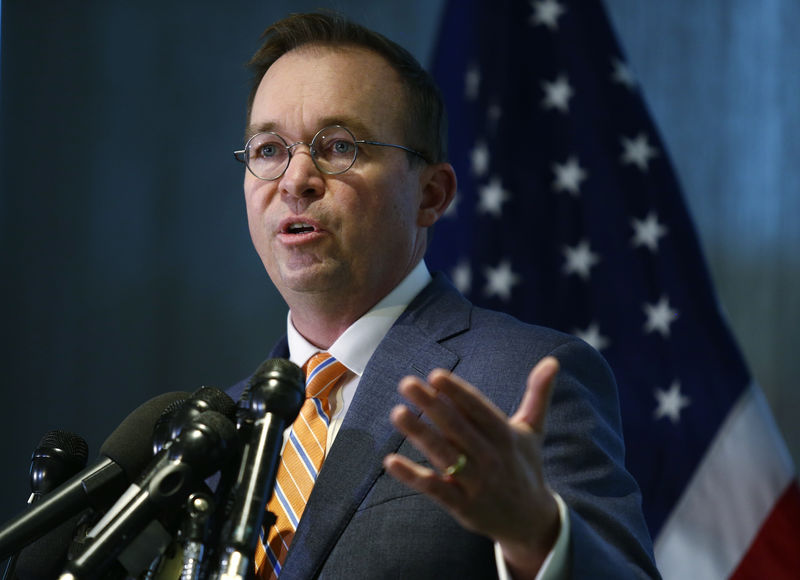 © Reuters. 0MB Director Mulvaney speaks to the media at the U.S. Consumer Financial Protection Bureau in Washington