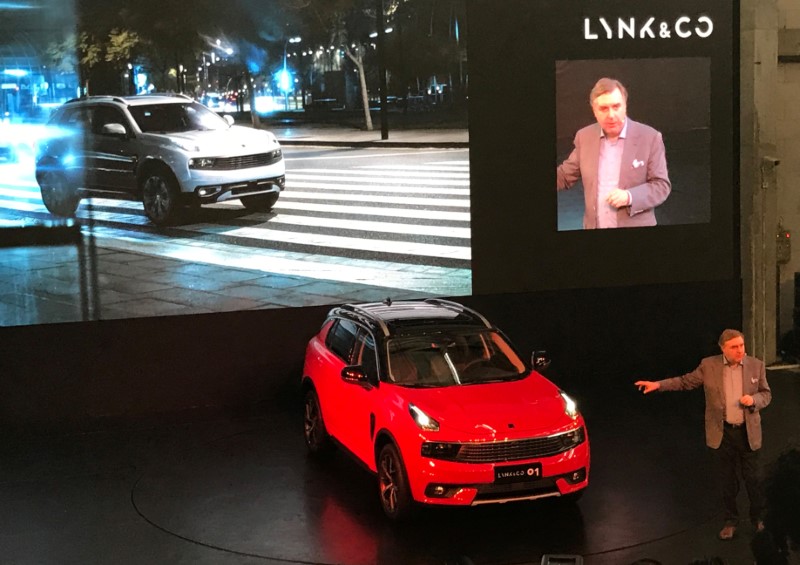 © Reuters. Geely unveils its Lynk & Co brand model, the 01 sport utility, at an event ahead of the Shanghai Auto show, in Shanghai