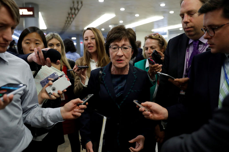 © Reuters. FILE PHOTO: Sen. Susan Collins (R-ME) speaks with reporters ahead of the party luncheons on Capitol Hill in Washington