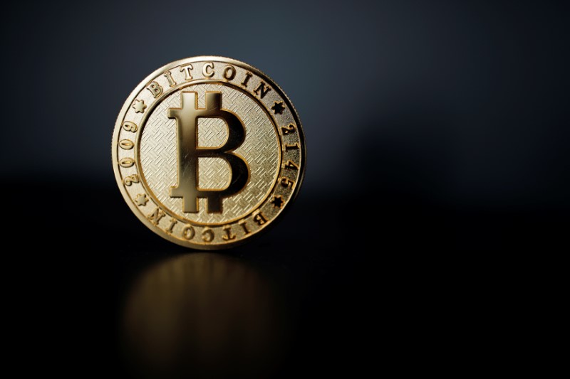 © Reuters. A Bitcoin (virtual currency) coin is seen in an illustration picture taken at La Maison du Bitcoin in Paris