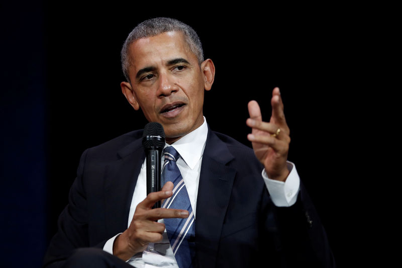 © Reuters. A PARIS, BARACK OBAMA DÉPLORE L'ABSENCE AMÉRICAINE SUR LE CLIMAT