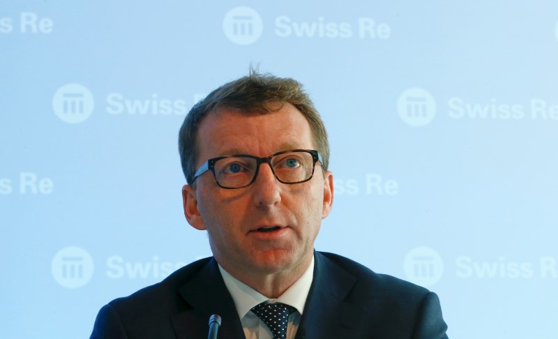 © Reuters. CFO Cole of reinsurer Swiss Re addresses the annual news conference in Zurich