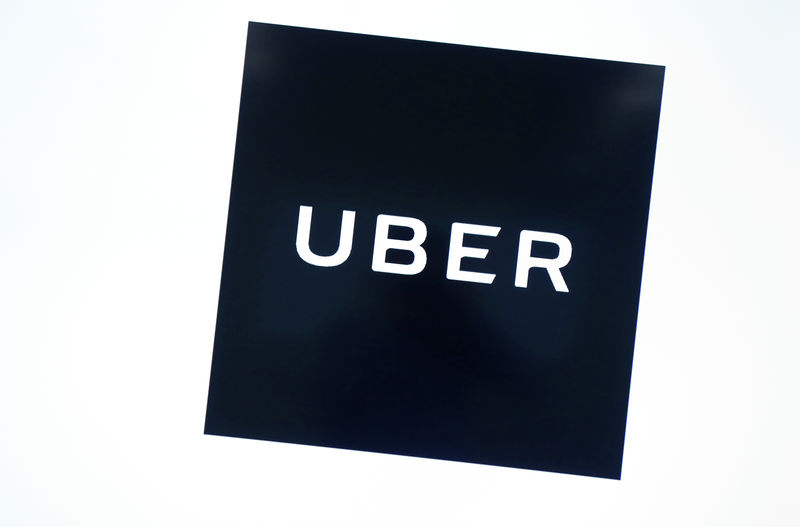 © Reuters. Uber's logo is pictured at its office in Tokyo