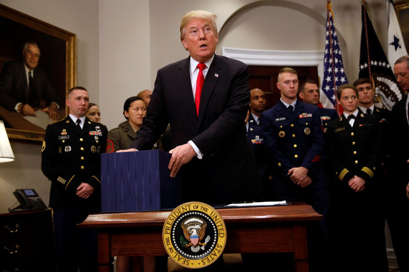 © Reuters. U.S. President Donald Trump participates in a signing ceremony for the National Defense Authorization Act for Fiscal Year 2018 at the White House in Washington D.C.