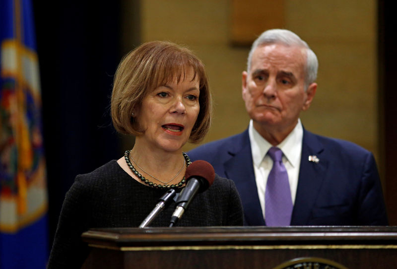 © Reuters. Minnesota Lieutenant Governor Tina Smith answers a question after Minnesota Governor Mark Dayton announced Smith to replace U.S. Senator Al Franken at the State Capitol in St. Paul