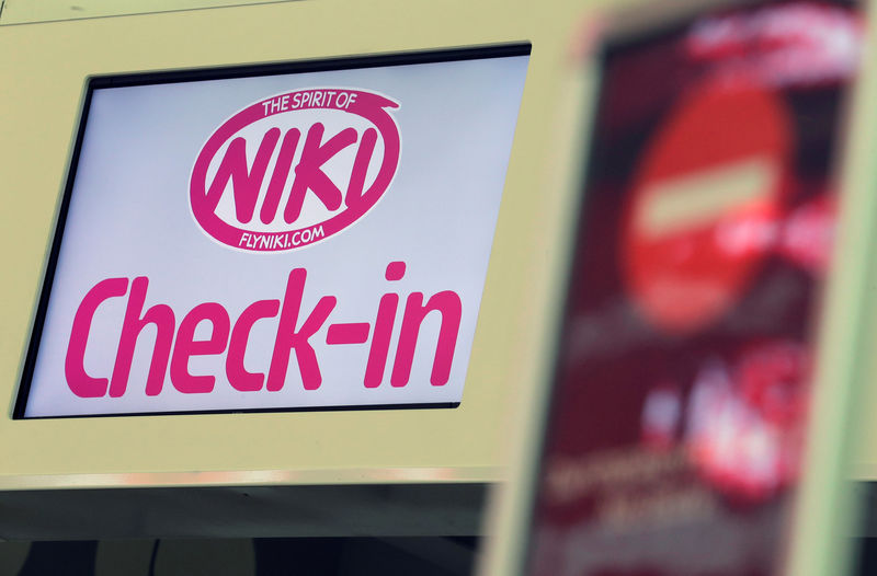 © Reuters. Empty Niki check-in counters are seen at Vienna International Airport in Schwechat
