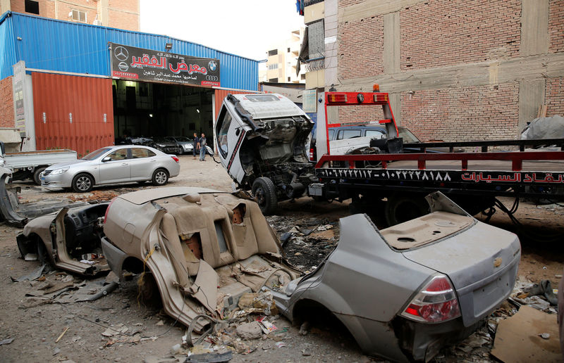© Reuters. A general view of El Fauquier (The Poor), a crash damaged vehicles and second-hand car shop, is pictured in Cairo