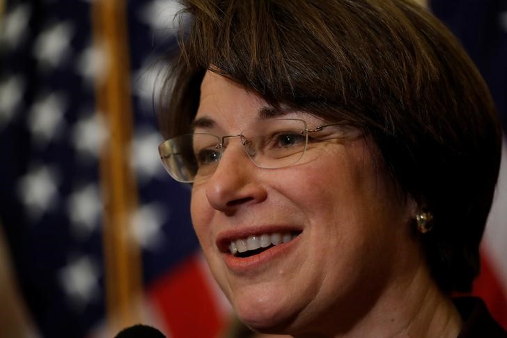 © Reuters. FILE PHOTO - Sen. Amy Klobuchar speaks at a news conference to unveil congressional Democrat's "A Better Deal" economic agenda on Capitol Hill in Washington