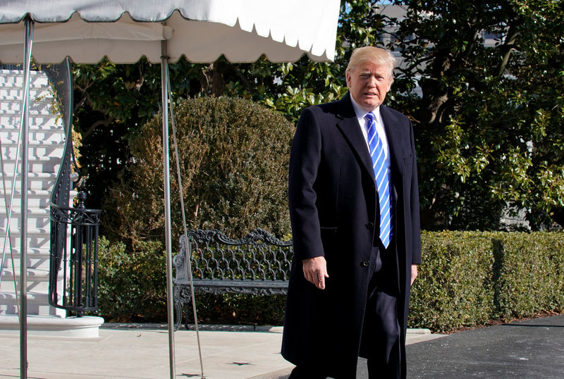 © Reuters. President Donald Trump walks out from the White House in Washington
