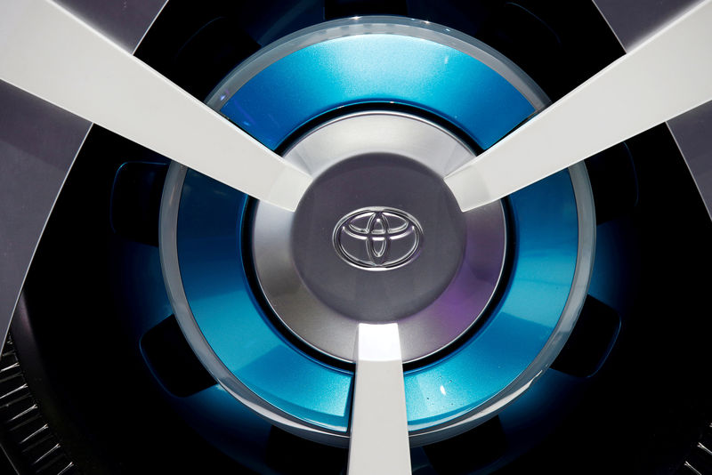© Reuters. FILE PHOTO: File picture of a Toyota logo on a wheel at the Mondial de l'Automobile in Paris