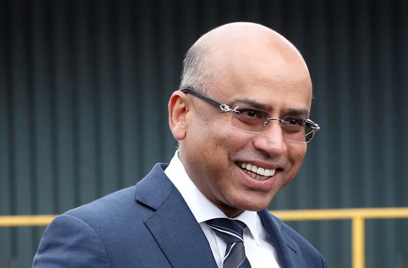 © Reuters. Liberty Steel's Sanjeev Gupta smiles outside their newly acquired Liberty Steel processing mill in Dalzell, Scotland