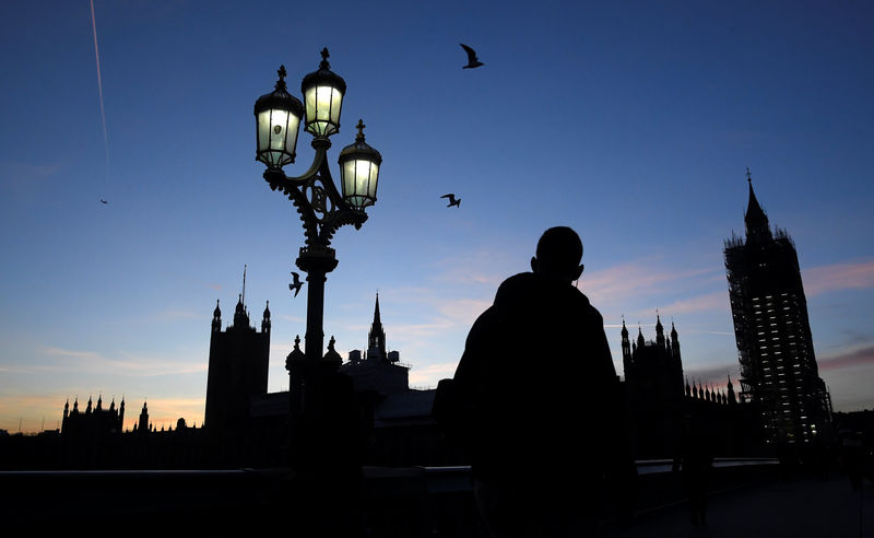 © Reuters. Britain's Palace of Westminster is silhouetted against the setting sun, London