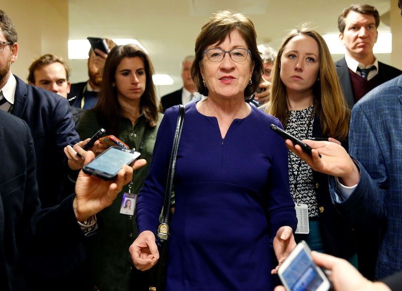 © Reuters. Senator Susan Collins (R-ME) speaks to reporters as she arrives for a nomination vote on Capitol Hill in Washington