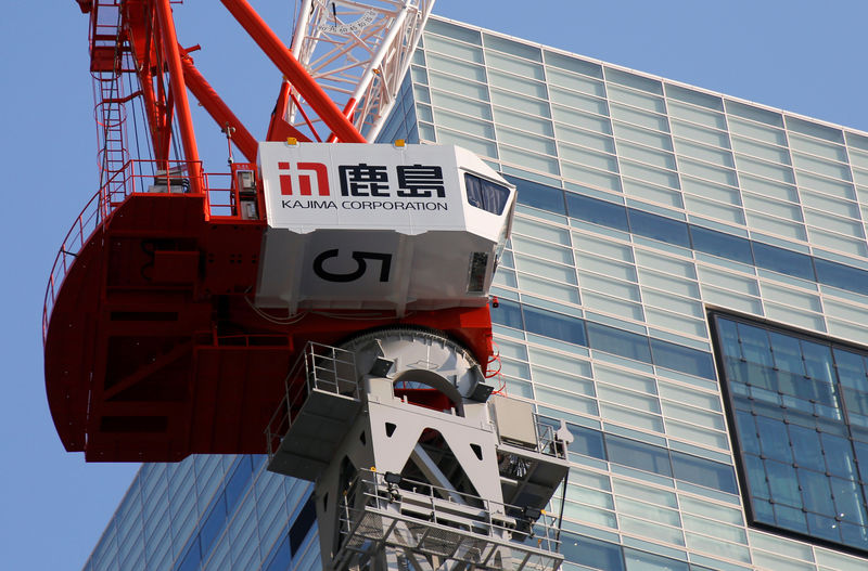 © Reuters. Logo of Kajima Corp is seen on a crane at a construction site in Tokyo