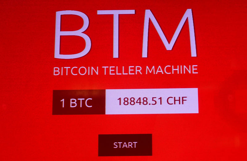 © Reuters. The display of a bitcoin ATM is seen in Zurich