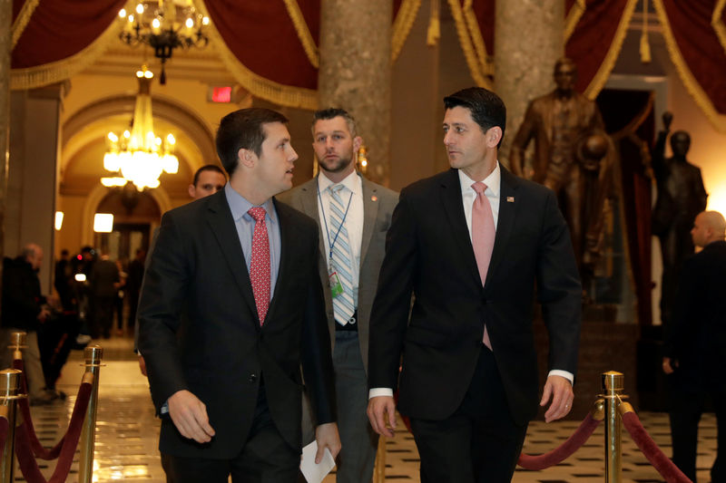 © Reuters. House Speaker Paul Ryan (R-WI) walks on Capitol Hill in Washington