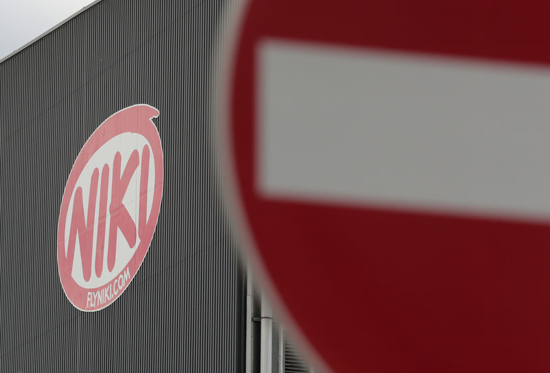 © Reuters. A Niki logo and a traffic sign are seen at Vienna International Airport in Schwechat