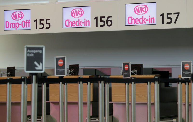 © Reuters. FILE PHOTO: Empty Niki check-in counters are seen at Vienna International Airport in Schwechat