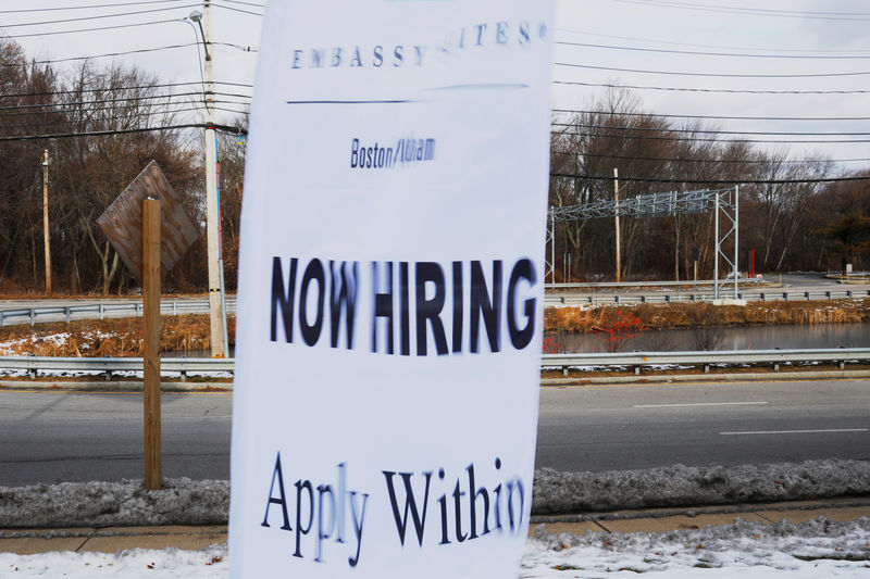 © Reuters. A sign advertises open jobs at an Embassy Suites hotel in Waltham