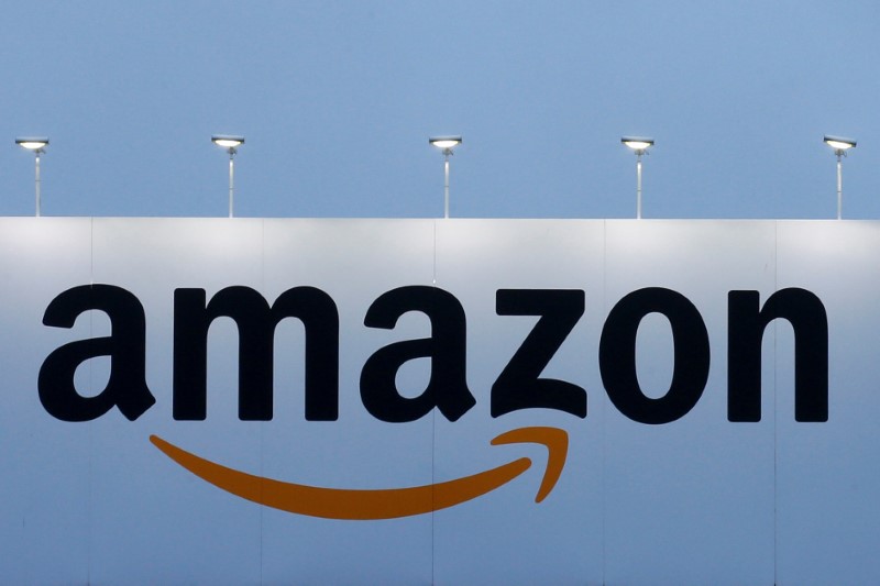 © Reuters. FILE PHOTO - The logo of Amazon is seen at the company logistics center in Lauwin-Planque northern France