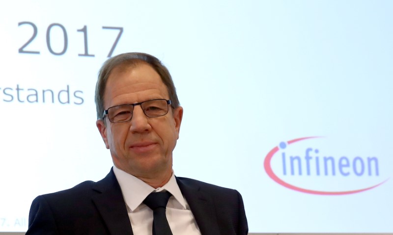 © Reuters. Ploss, CEO of Infineon arrives for the annual news conference in Neubiberg