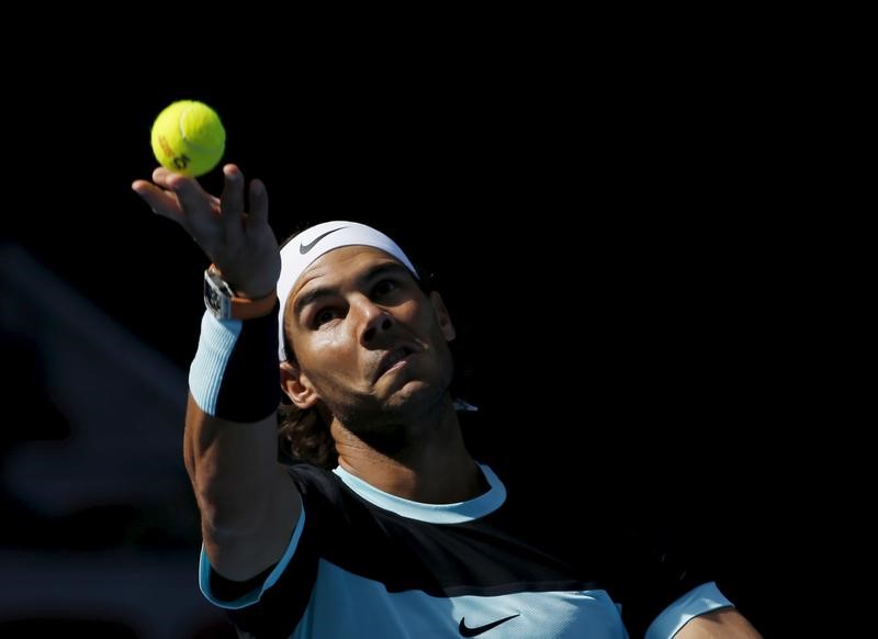 © Reuters. Rafa Nadal of Spain serves a ball against Fabio Fognini of Italy during their men's singles semifinal match at the China Open tennis tournament in Beijing