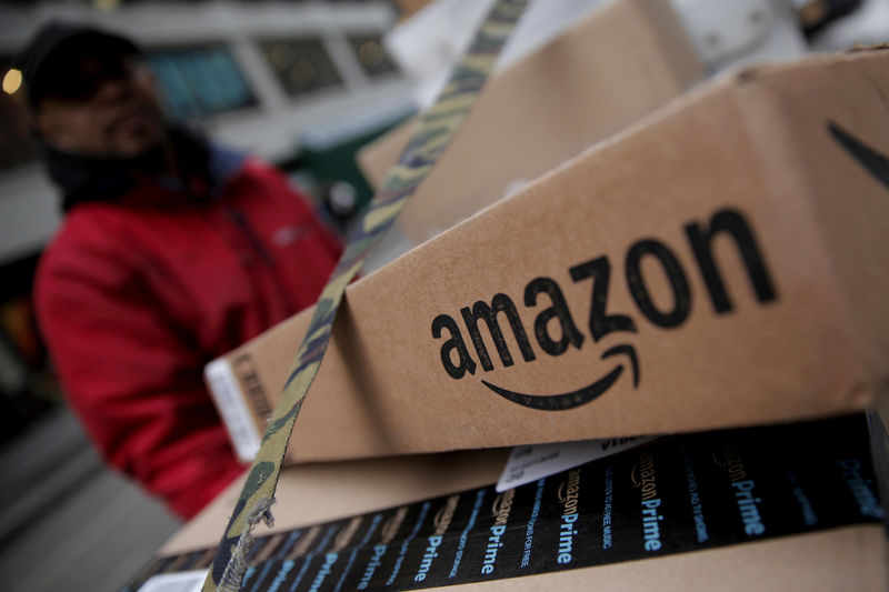 © Reuters. FILE PHOTO: Amazon boxes are seen stacked for delivery in Manhattan