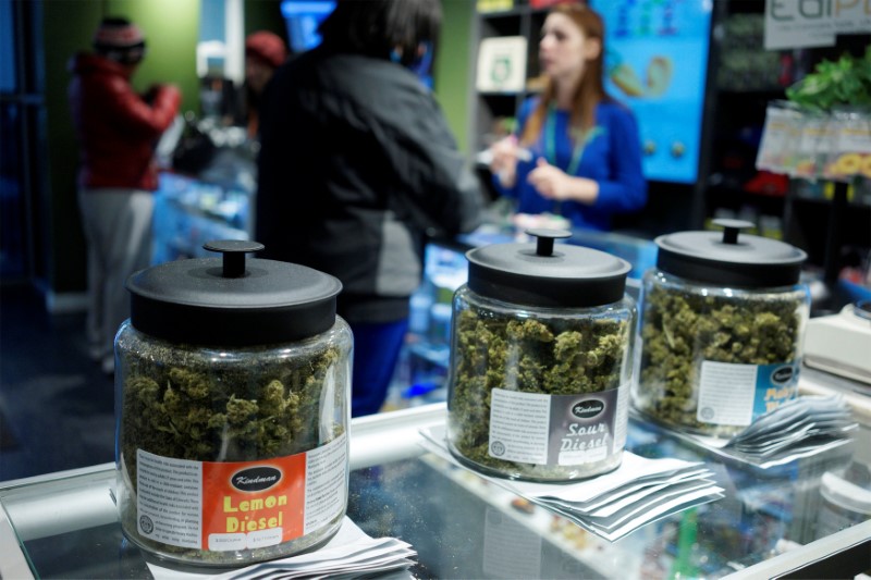 © Reuters. FILE PHOTO: Customers shop for "Green Friday" deals at the Grass Station marijuana shop on Black Friday in Denver