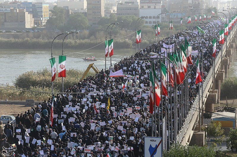 © Reuters. People take part in pro-government rallies, Iran