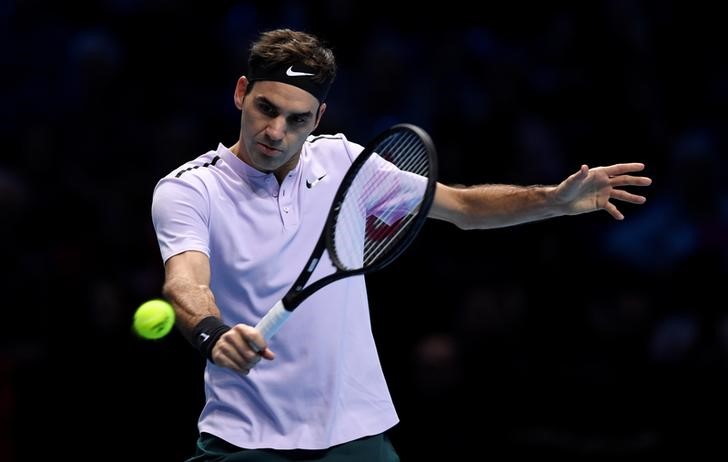 © Reuters. Federer lleva a Suiza a ganar su tercera Copa Hopman