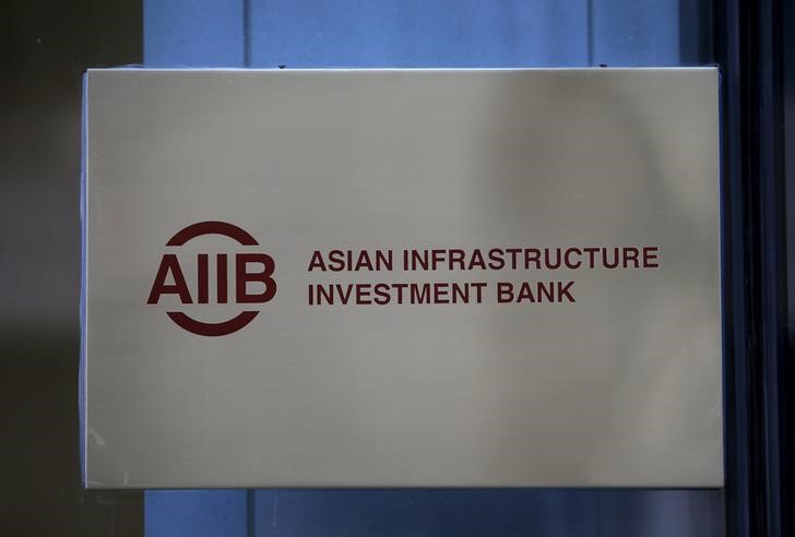 © Reuters. The signboard of Asian Infrastructure Investment Bank (AIIB) is seen at its headquarter building in Beijing