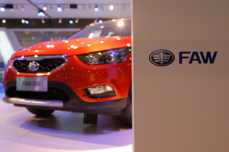 © Reuters. Logo of Faw is seen on car maker's booth at 2016 Moscow International Auto Salon in Moscow