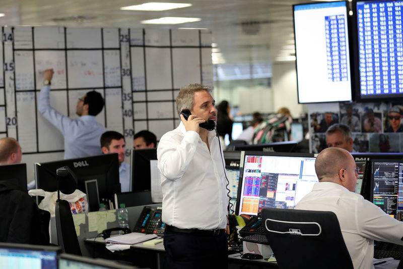 © Reuters. A broker speaks on the phone on the dealing floor at ICAP in London