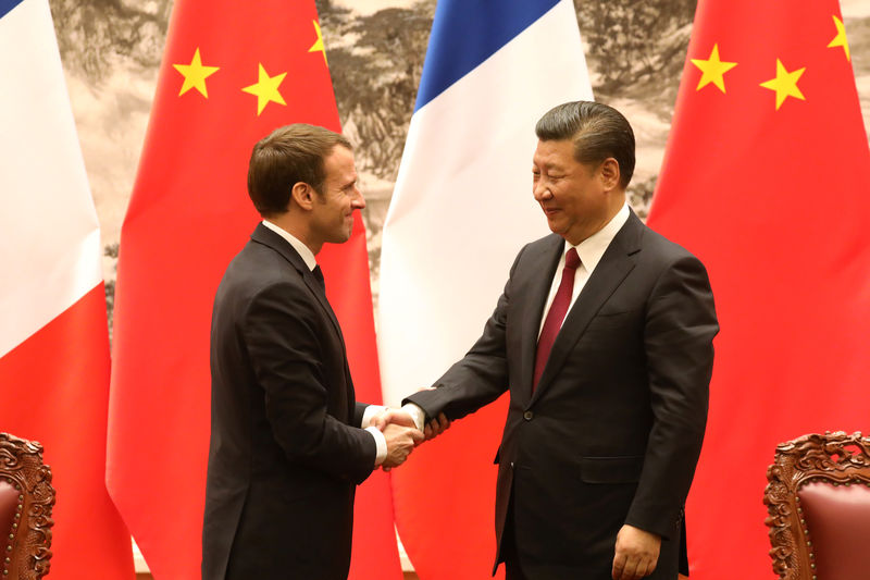 © Reuters. FRANCE ET CHINE RESSERRENT LEURS LIENS FACE AUX DÉFIS GLOBAUX