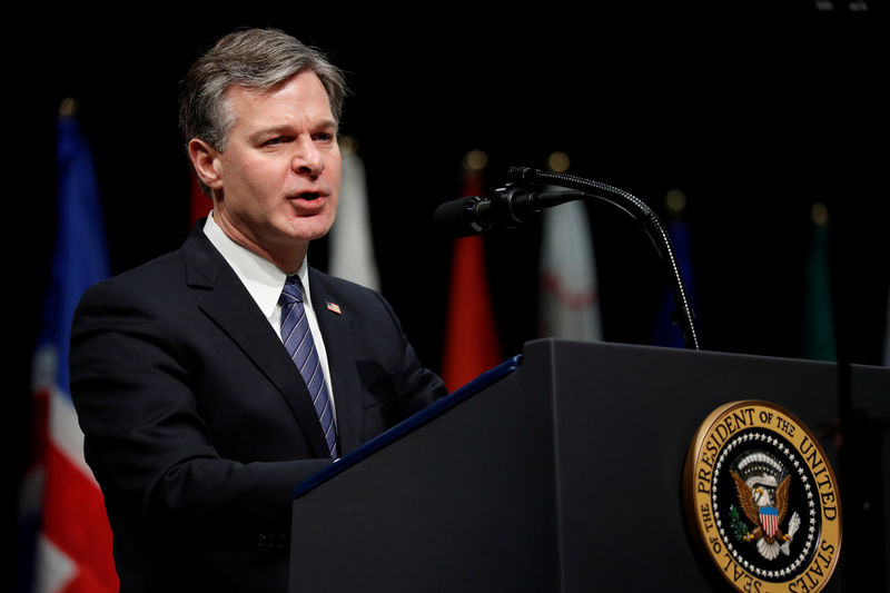 © Reuters. FBI Director Christopher Wray delivers remarks to a graduation ceremony at the FBI Academy on the grounds of Marine Corps Base Quantico in Quantico, Virginia