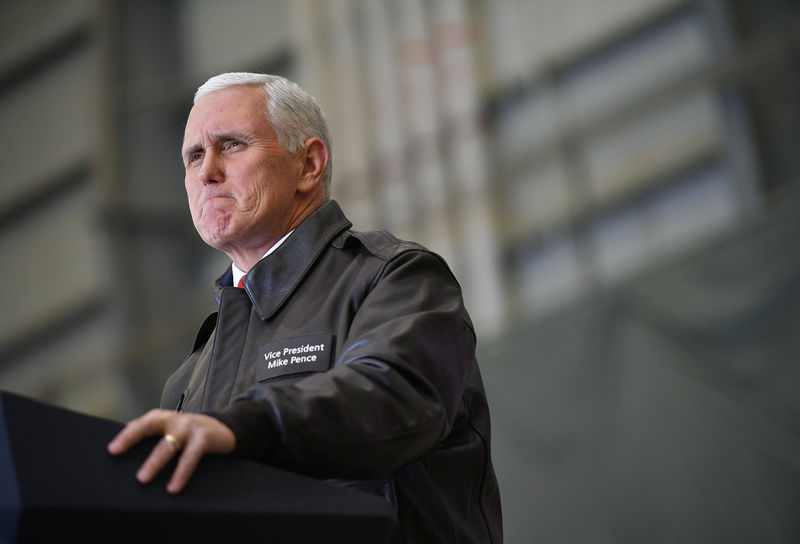 © Reuters. FILE PHOTO: U.S. Vice President Mike Pence speaks to troops in a hangar at Bagram Air Field in Afghanistan